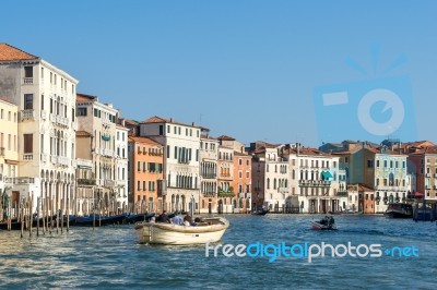 Powerboat Cruising Down The Grand Canal Stock Photo