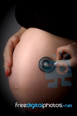 Pregnant Lady With Stethoscope Stock Photo