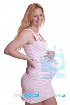 Pregnant Woman Holding Tummy Stock Photo