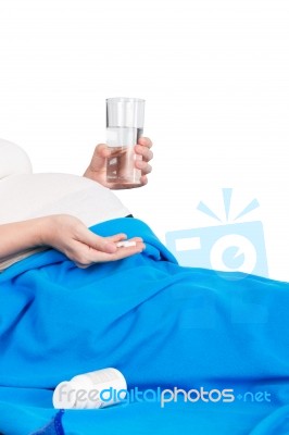 Pregnant Woman With Glass Of Water And Tablets In Hand Stock Photo