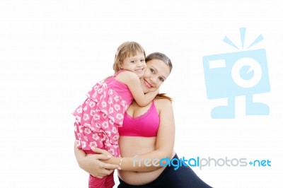 Pregnant Woman With Her Daughter Stock Photo