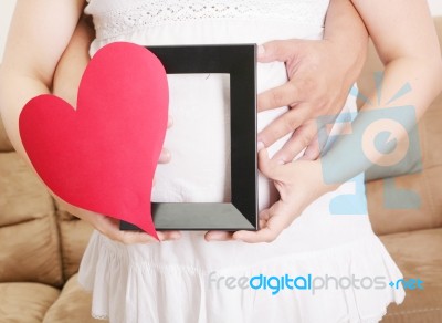 Pregnant Women With Her Husband Waiting For Her Baby Stock Photo