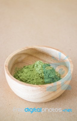 Premium Green Tea Powder In Wooden Bowl Stock Photo