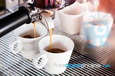 Prepares Espresso In  Coffee Shop Stock Photo