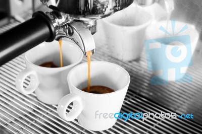 Prepares Espresso In Coffee Shop With Black And White Background… Stock Photo