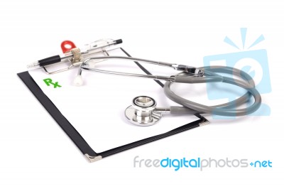 Prescription On Clipboard And Stethoscope Stock Photo