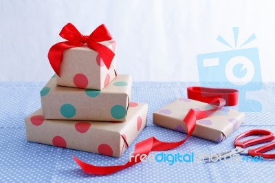 Presents With Wrapped Boxes On Table Stock Photo