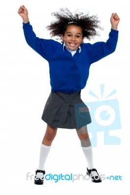 Pretty African School Girl Dances In Full Swing Stock Photo