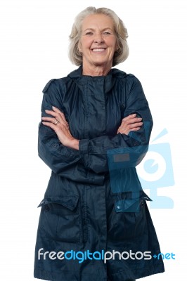 Pretty Aged Woman In Stylish Overcoat Stock Photo