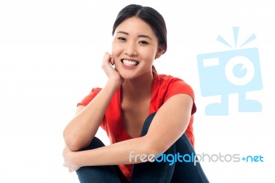 Pretty Asian Girl Smiling Heartily Stock Photo