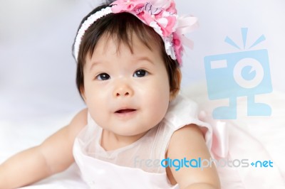 Pretty Baby Girl Is Smiling Stock Photo