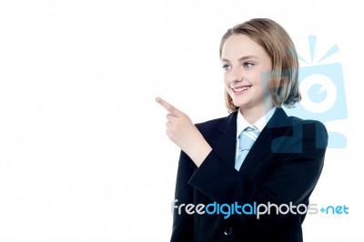 Pretty Business Girl Pointing At Something Stock Photo