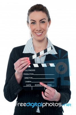 Pretty Business Lady With Clapperboard Stock Photo