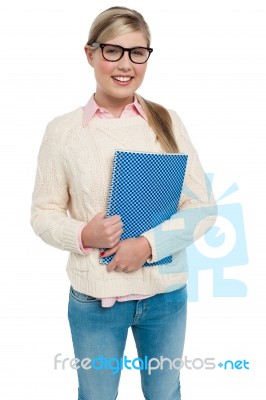 Pretty College Student Posing With Spiral Notebook Stock Photo