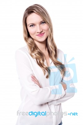 Pretty Confident Woman With Folded Arms Stock Photo