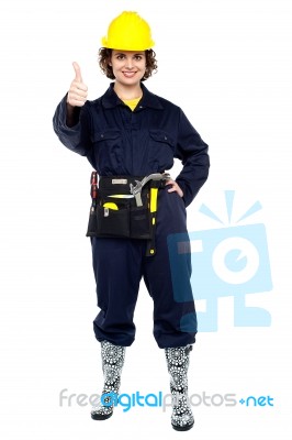 Pretty Construction Worker Gesturing Success Stock Photo