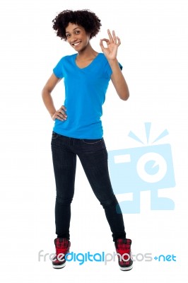 Pretty Female Model Gesturing Perfect Sign Stock Photo