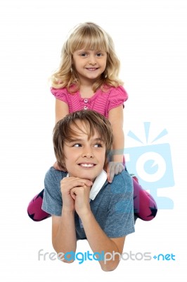 Pretty Girl Child Playing With Her Brother Stock Photo