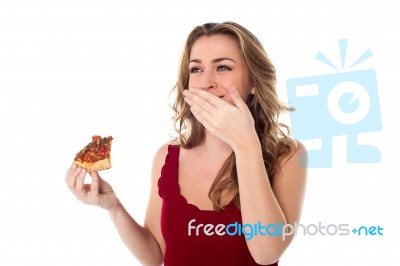 Pretty Girl Enjoying Yummy Pizza Slice Stock Photo