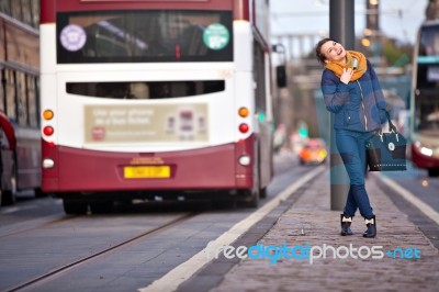 Pretty Girl Walking On The Road Stock Photo