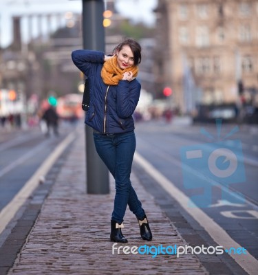 Pretty Girl Walking On The Road Stock Photo