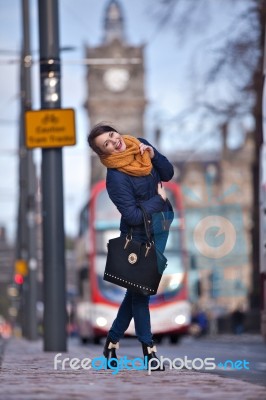 Pretty Girl Walking On The Road Stock Photo