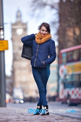 Pretty Girl Walking On The Road Stock Photo