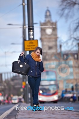 Pretty Girl Walking On The Road Stock Photo