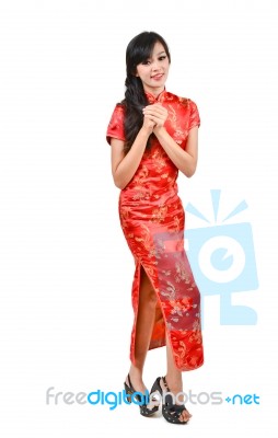 Pretty Girl With Cheongsam Wishing You A Happy Chinese New Year Stock Photo