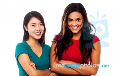 Pretty Girls Posing With Arms Crossed Stock Photo