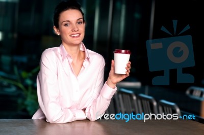 Pretty Lady Enjoying Chilled Liquid At Refreshment Stock Photo