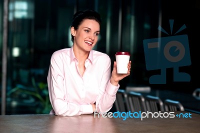 Pretty Lady Enjoying Chilled Liquid Refreshment Stock Photo