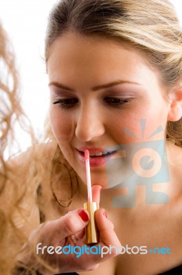 Pretty Model Getting Lip Makeup Stock Photo