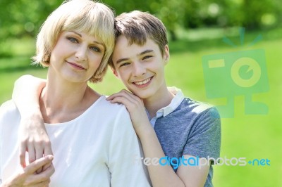 Pretty Mother With Her Charming Son Stock Photo