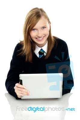 Pretty Schoolgirl Holding Newly Launched Tablet Pc Stock Photo