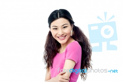 Pretty Slim Girl With Folded Arms Stock Photo