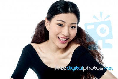 Pretty Smiling Girl In Black Top Stock Photo