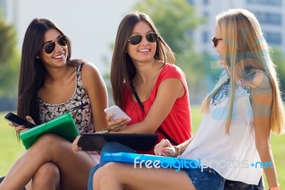 Pretty Student Girls Having Fun At The Campus Stock Photo