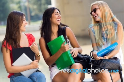 Pretty Student Girls Having Fun At The Campus Stock Photo