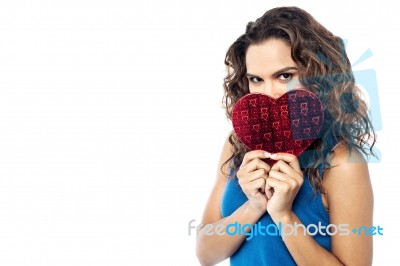 Pretty Woman  Holding Heart Shape Gift Box Stock Photo