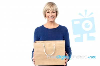 Pretty Woman Holding Shopping Bag Stock Photo