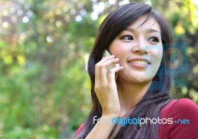 Pretty Woman Making A Phone Call Stock Photo