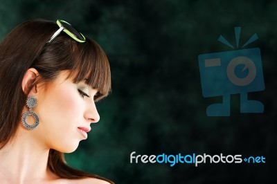 Pretty Woman On Dark Background Stock Photo