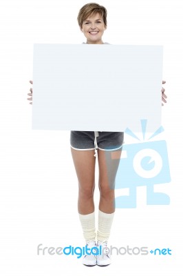 Pretty Woman Presenting Blank Whiteboard Stock Photo