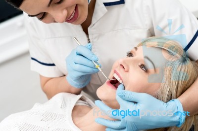 Pretty Woman Under Dental Treatment Stock Photo