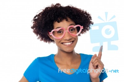 Pretty Woman Wearing Funny Heart Shaped Frame Stock Photo