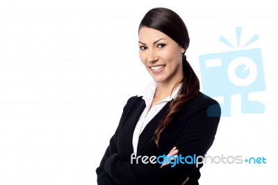 Pretty Woman With Folded Arms Stock Photo