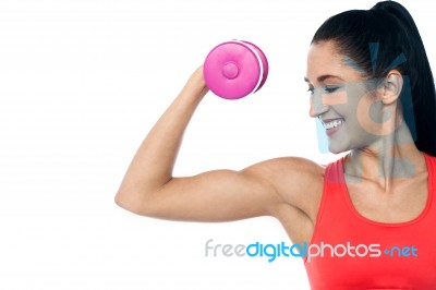 Pretty Woman Working Out With Dumbbell Stock Photo