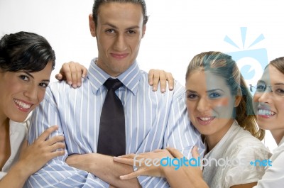 Pretty Women Holding To Man Stock Photo