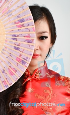 Pretty Women With Chinese Traditional Dress Cheongsam And Hole C… Stock Photo